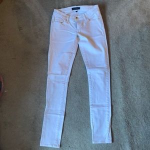 White skinning Juicy Couture jeans